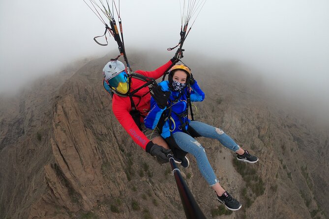 Acrobatic Paragliding Flight with Spanish Champion in Tenerife - Photos included: what you get for the base price and what’s optional