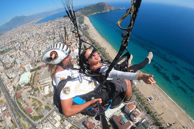 Antalya Paragliding Experience By Local Expert Pilots - Your Tandem Flight: 10–15 Minutes, Wind Changes, and Asking for Loops