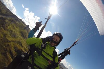 Davos Absolutely Free Flying Paragliding Tandem Flight 1'000 Meters High - Getting started at Brämabüelstrasse 9 and riding up with your pilot