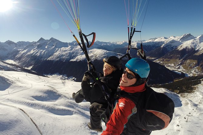 Davos Paragliding Private Tandem Pilot Half Day - Cable cars and the 10–20 minute hike to the launch site