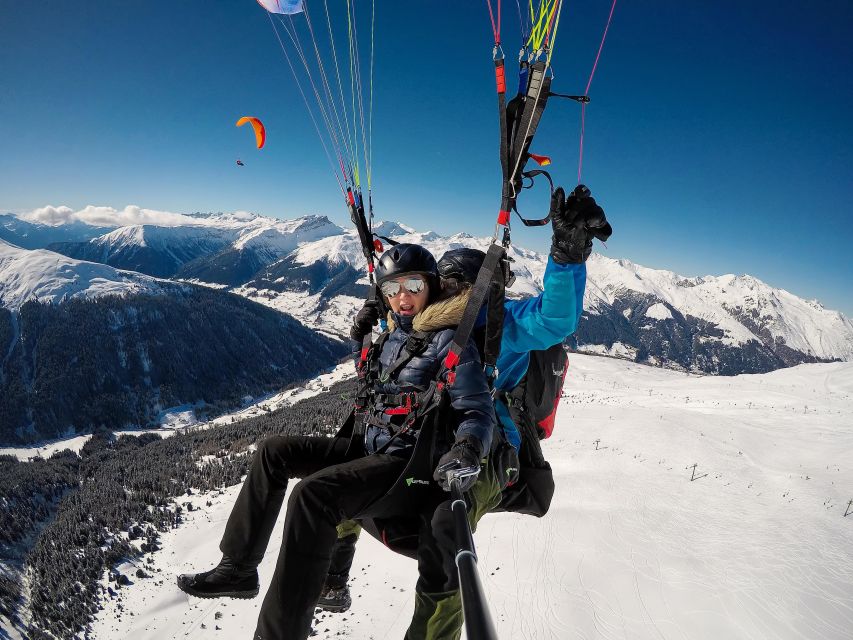 Davos: Tandem Paragliding Flight - From steps to flight: launch run, talking midair, and steering options