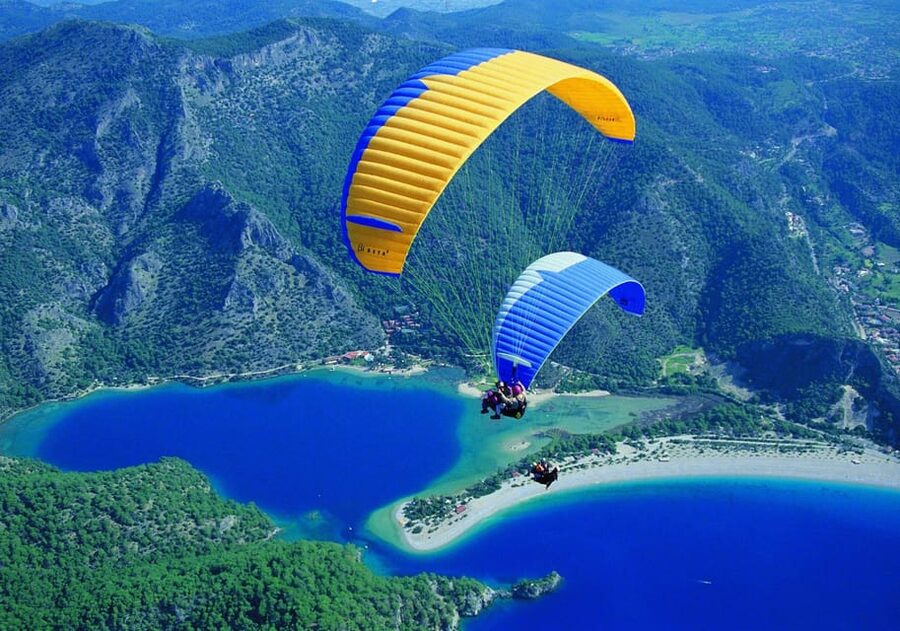 From Fethiye: Oludeniz Paragliding Trip with Transfer - The 30-minute mountain climb and selecting the right take-off piste