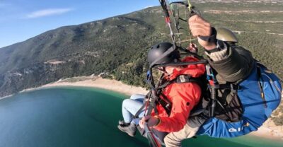 From Lisbon: Paragliding Pack (Flight+Video+Transportation) - The Lisbon pickup: simple meeting point, shared ride to the secret spot