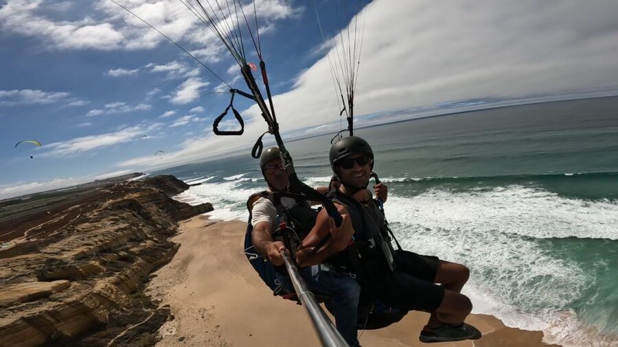 From Lisbon: Paragliding Tandem Flight - Safety and guidance: what the best pilots focus on