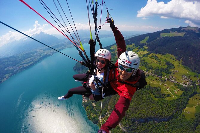 Full-Day Guided Tour To Interlaken with Paragliding Flight - Zurich to Interlaken by panoramic bus: the easy start