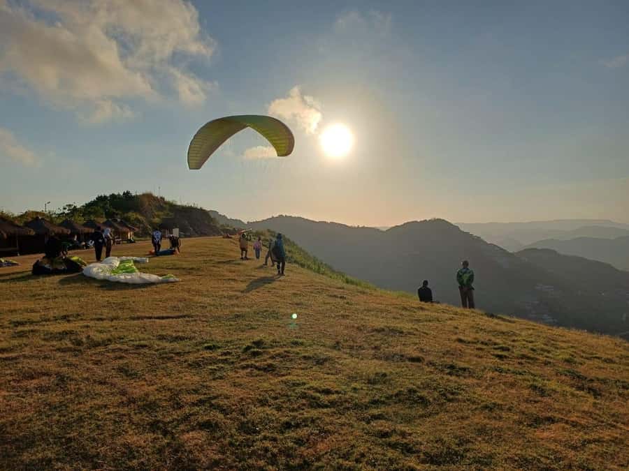 Kuta Lombok : Tandem Paragliding with Pilot & Beach Tour - Selong Belanak beach: swimming, sun time, and an easy surf lesson setup