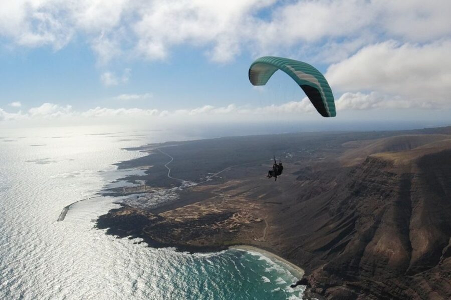 Lanzarote: Tandem Paragliding Flight Over Lanzarote - Seeing Lanzarote from above: volcanic geometry, ocean edges, and real scale