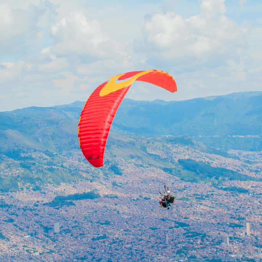 Paraglide over beautiful Medellin - Your 15–20 Minute Tandem Paragliding Flight Over Medellín and the Andes