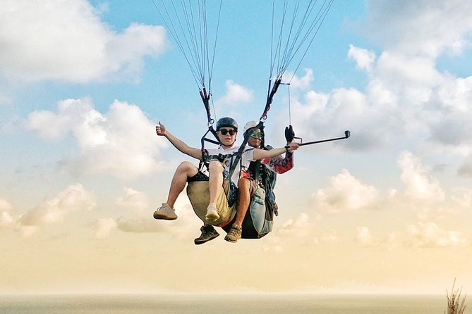 Paragliding Bali Nusa Dua cliff with Free Photo/Videos - Where You Meet: Panda Paragliding at Jl. Karang Pandawa