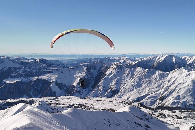 Paragliding Tandem Flights in Gudauri - What your 15 minutes look like: Aragvi Gorge in summer, ski slopes in winter