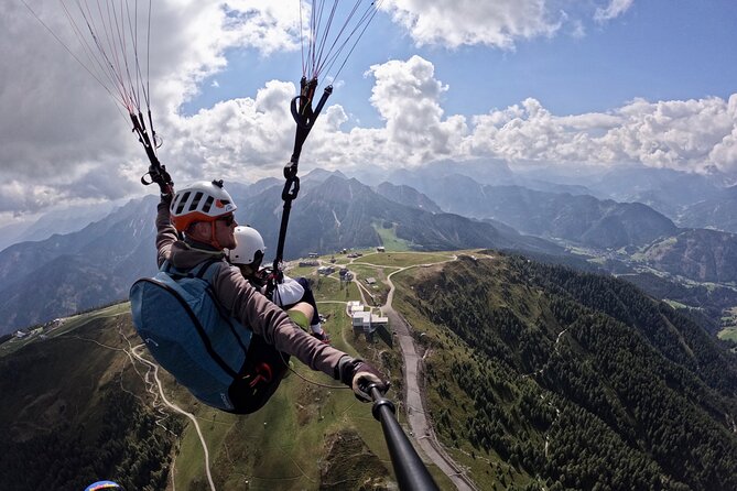 Private Paragliding Tandem flight Dolomites Alps Kronplatz - Landing Back at the Start and Getting Photos to Your Phone