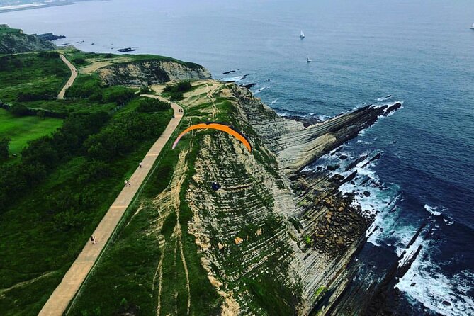 Private Tandem Paragliding Flight in Bizkaia - Cruising over Bilbao, Barrika, and Uribe Kosta from above