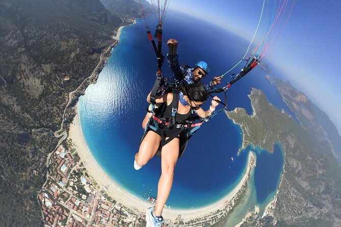Tandem Paragliding Flight Experience Babadağ Mountain Fethiye - Landing back by the office: photos, videos, and that Italian hand coffee