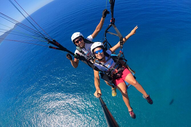Tandem Paragliding Flight in Taormina - Landing and Your Micro SD Card: Instant Memories, Not a Maybe