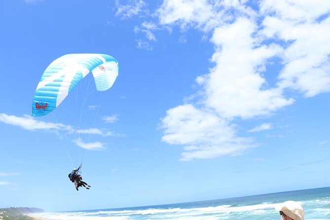 Tandem Paragliding Instructional Flights in Garden Route - Getting harnessed: a quick physical step before takeoff