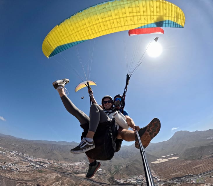Tenerife: Tandem Paragliding in Adeje with hotel transfer - Getting There: Hotel Pickup, Coach Rides, and Wind Waiting